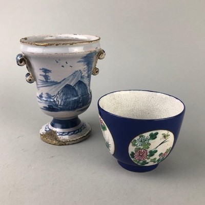 Lot 182 - A BLUE AND WHITE VASE AND A TEA BOWL