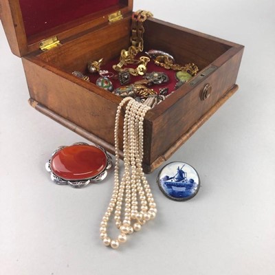Lot 232 - A LOT OF COSTUME JEWELLERY CONTAINED IN A WALNUT CASKET