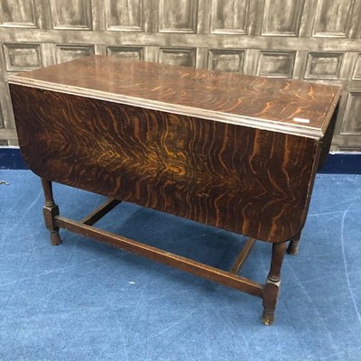 Lot 275 - AN OAK DROP LEAF DINING TABLE