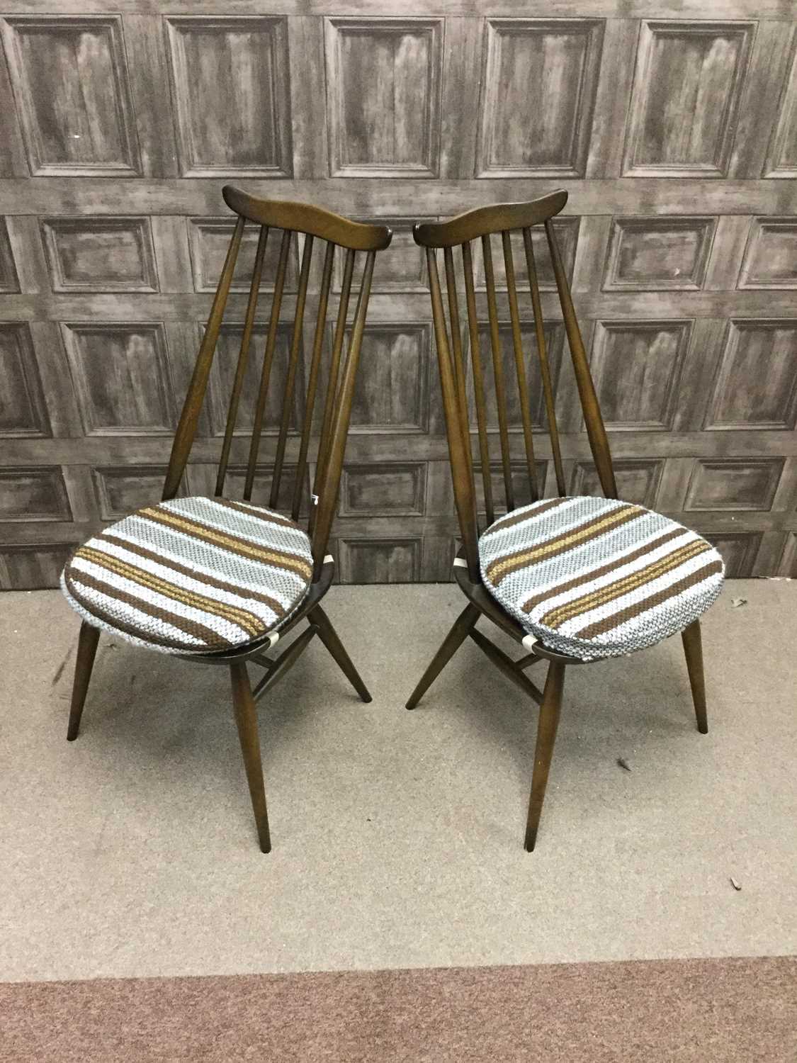 Lot 1462 - A SET OF FOUR ERCOL SPINDLE BACKED DINING CHAIRS
