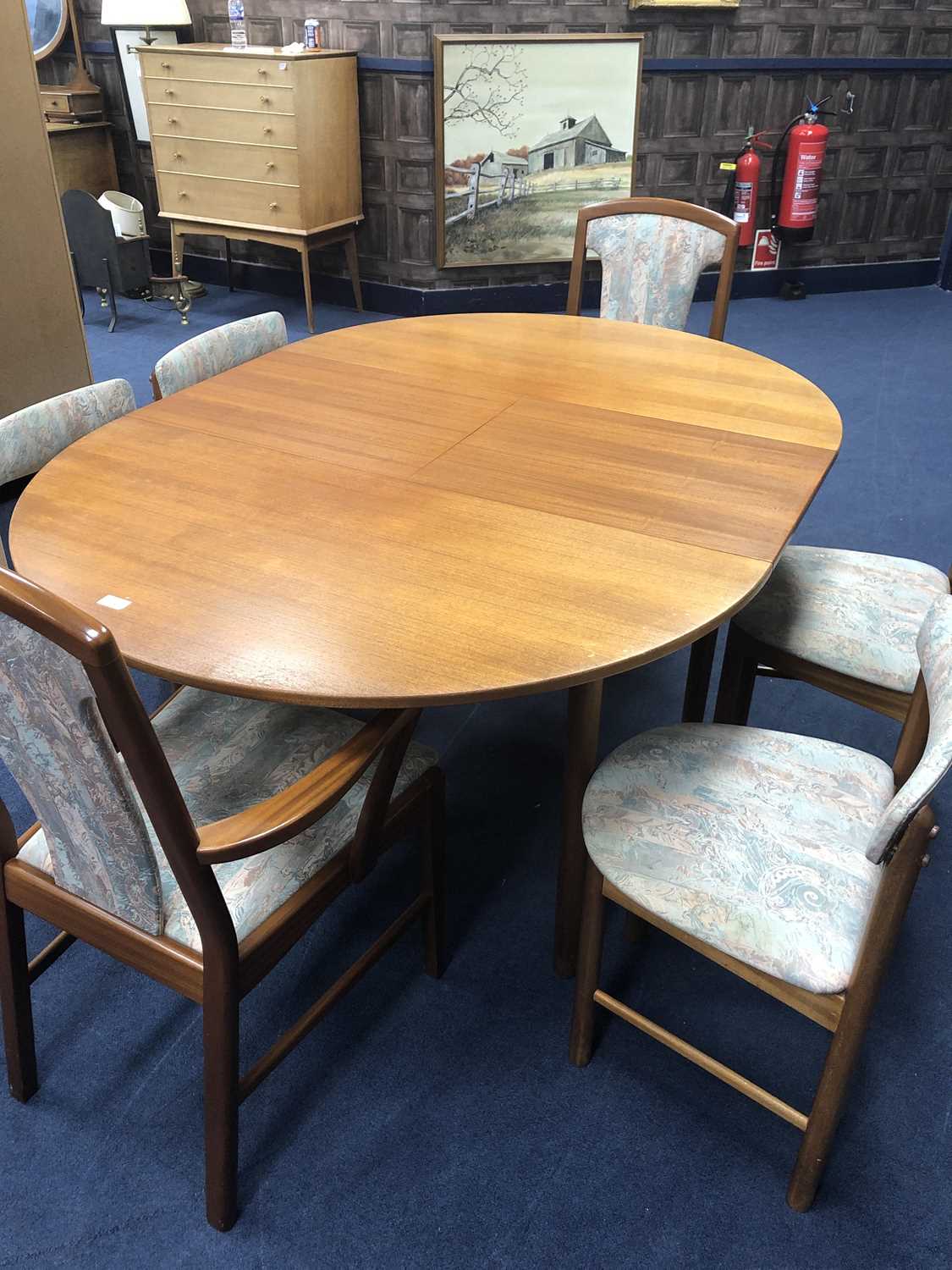 Lot 328 - A RETRO DINING TABLE AND SIX CHAIRS