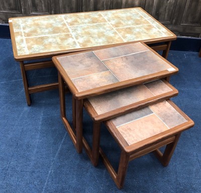 Lot 327 - A NEST OF THREE TILE TOPPED TABLES AND A SIMILAR COFFEE TABLE