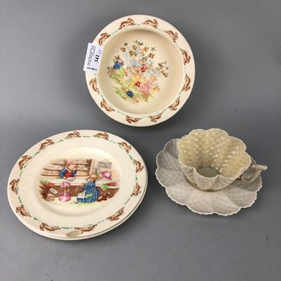 Lot 342 - A BELLEEK CUP AND SAUCER, BUNNYKINS PLATES AND A BOWL