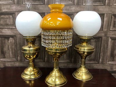 Lot 402 - A BRASS ELECTRIC TABLE LAMP AND TWO OTHERS