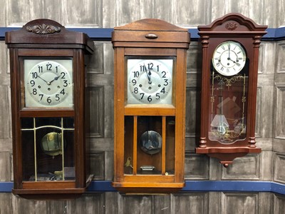 Lot 405 - A LOT OF TWO STAINED WOOD WALL CLOCKS AND ANOTHER CLOCK