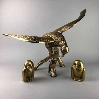 Lot 414 - A 20TH CENTURY BRASS MODEL OF BIRD OF PREY AND TWO BRASS OWLS