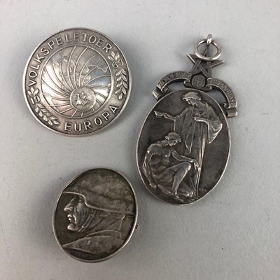 Lot 292 - A SILVER PENDANT AND TWO BADGES