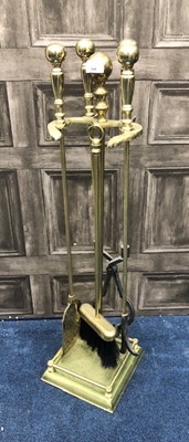 Lot 368 - A BRASS FIRE COMPANION