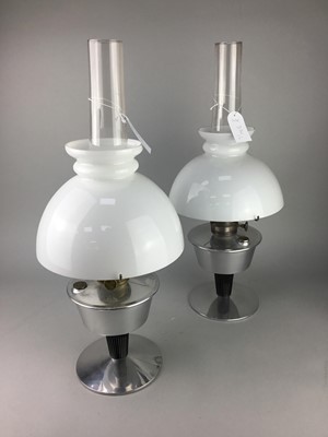 Lot 376 - A PAIR OF PARAFFIN STYLE TABLE LAMPS AND A BRASS ELECTRIC LAMP