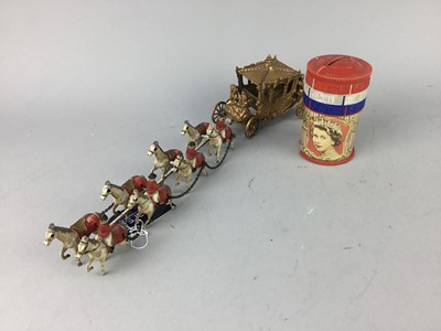 Lot 317 - A MONEY BOX AND A BRITAINS MODEL OF CORONATION CARRIAGE