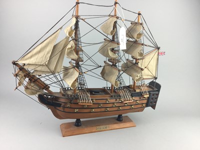 Lot 439 - A STAINED WOOD MODEL OF THE H.M.S. VICTORY