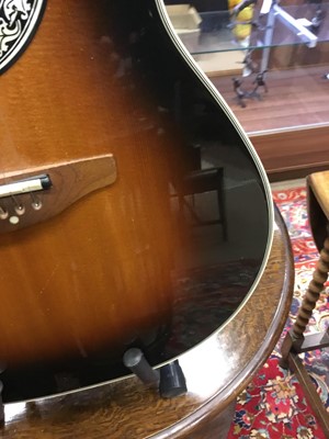 Lot 1177 - AN OVATION ELECTRIC-ACOUSTIC GUITAR