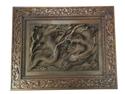 Lot 748 - A CHINESE CARVED WOOD PANEL