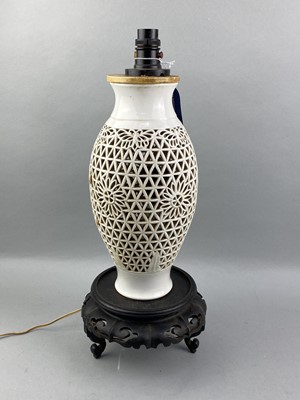 Lot 21 - A CERAMIC LAMP WITH RETICULATED BODY AND A VARIETY OF TEA SERVICES