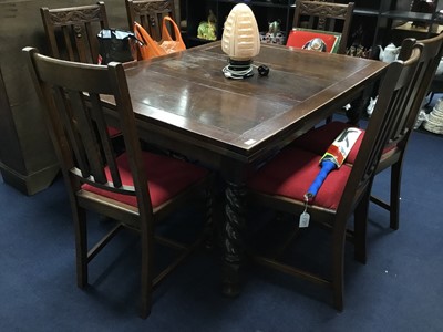 Lot 131 - AN OAK DINING TABLE AND SIX CHAIRS