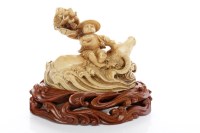 Lot 853 - EARLY 20TH CENTURY CHINESE IVORY CARVING of a...