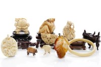 Lot 865 - THREE EARLY 20TH CENTURY CHINESE IVORY FIGURES...