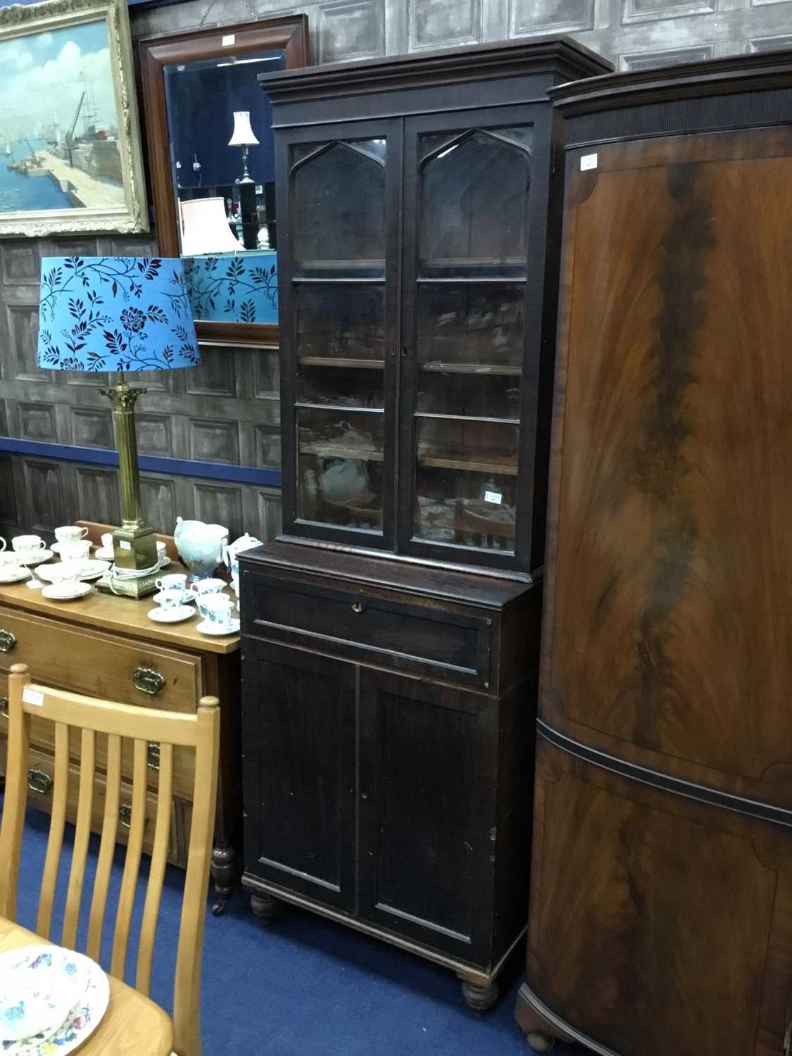 Lot 93 - A 19TH CENTURY STAINED WOOD BOOKCASE ON CHEST