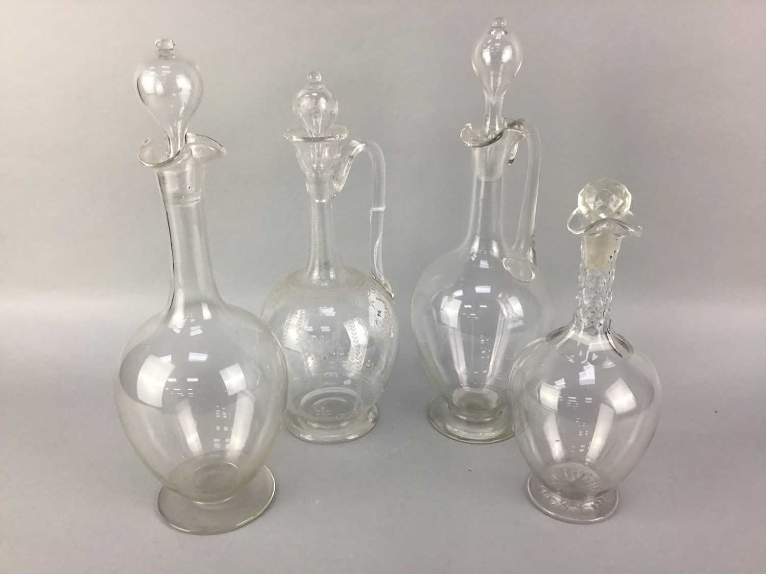Lot 94 - A 19TH CENTURY ETCHED GLASS DECANTER AND THREE OTHERS