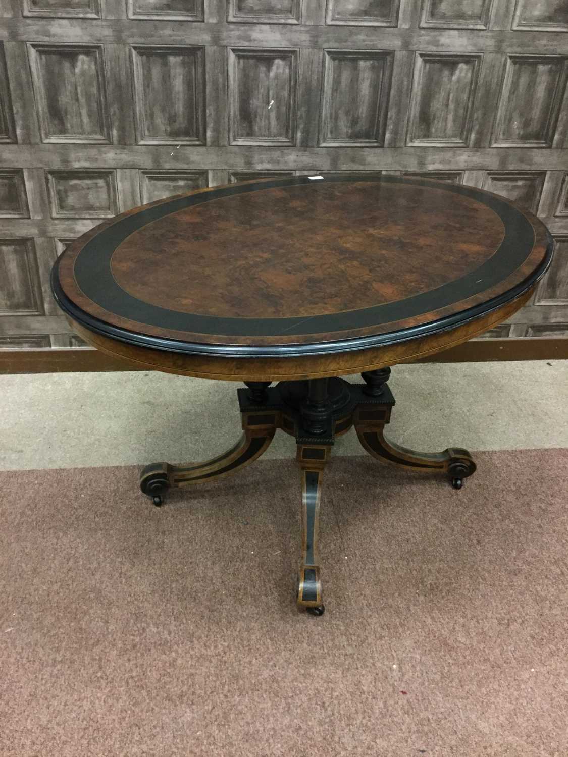 Lot 1605 - A VICTORIAN WALNUT AND EBONISED OVAL LOO TABLE