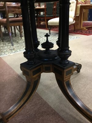 Lot 1605 - A VICTORIAN WALNUT AND EBONISED OVAL LOO TABLE
