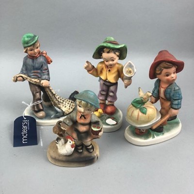 Lot 122 - A GERMAN FRIEDEL FIGURE OF A BOY WITH FISH AND OTHER ITEMS