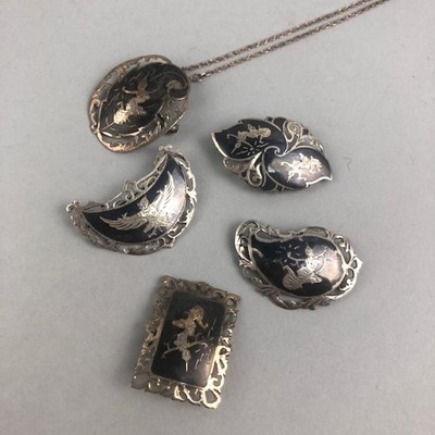 Lot 246 - A SIAM SILVER PENDANT ON CHAIN AND FOUR BROOCHES