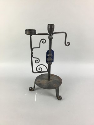 Lot 251 - A LATE 19TH CENTURY AESTHETIC IRON CANDLESTICK