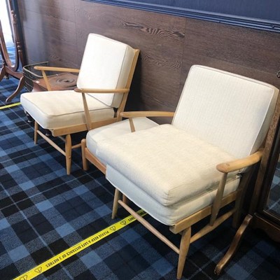 Lot 227 - A PAIR OF ERCOL OAK ARM CHAIRS AND FOOTSTOOL