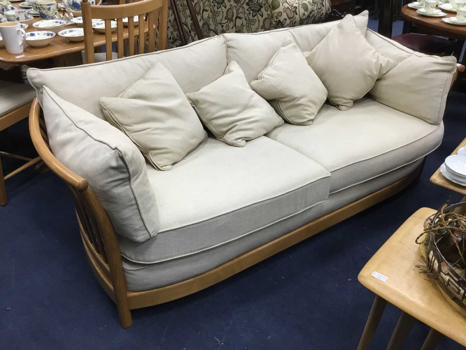 Lot 228 - AN ERCOL OAK THREE SEATER SOFA AND TWO SEATER SOFA