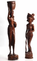 Lot 897 - TWO BALINESE CARVED WOOD FIGURES OF WOMEN each...