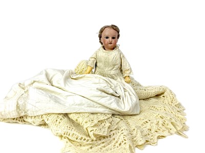 Lot 231 - AN ARMAND MARSEILLE BISQUE HEADED DOLL