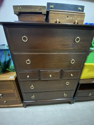 Lot 359 - A PAIR OF STAG CHEST OF DRAWERS ALONG WITH A PAIR OF BEDSIDE TABLES