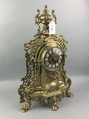 Lot 376 - A BRASS MANTEL CLOCK