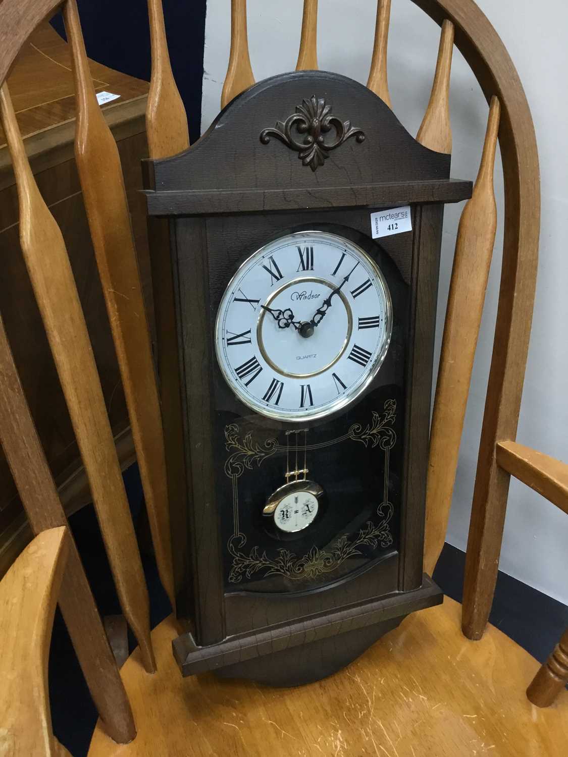 Lot 412 A REPRODUCTION WALL CLOCK