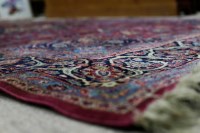 Lot 935 - EARLY 20TH CENTURY PERSIAN FRINGED RUG the...