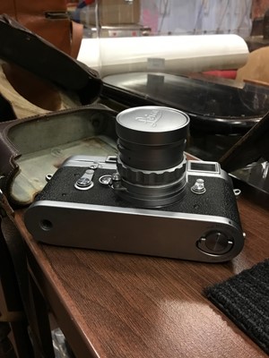 Lot 1107 - A LEICA CAMERA WITH FITTED LENS AND TWO OTHERS