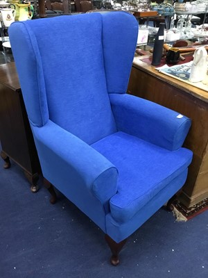Lot 448 - A PAIR OF MODERN WING BACK ARMCHAIRS