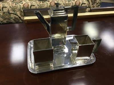 Lot 450 - A MODERNIST PLATED THREE PIECE TEA SERVICE AND TRAY