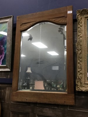 Lot 534 - A RECTANGULAR WALL MIRROR AND A HANGING SHELF