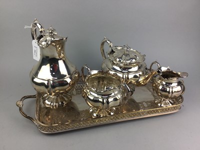 Lot 109 - A SILVER PLATED FOUR PIECE SERVICE ON A RECTANGULAR TRAY