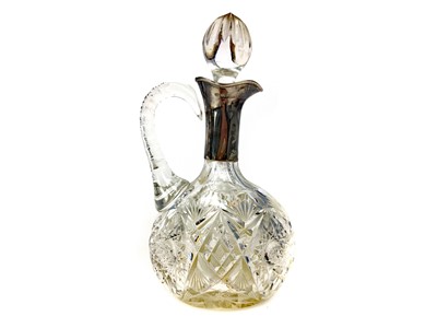 Lot 504 - A SILVER COLLARED CLARET JUG AND STOPPER