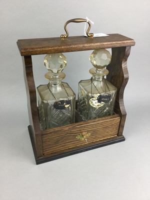 Lot 299 - AN OAK TWO BOTTLE TANTALUS