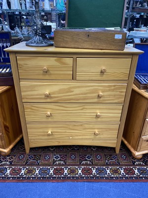 Lot 277 - A PINE CHEST OF DRAWERS AND TWO BEDSIDE CHESTS