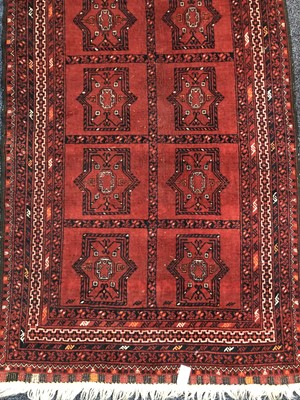 Lot 521 - A 20TH CENTURY AFGHAN BOKHARA RUG