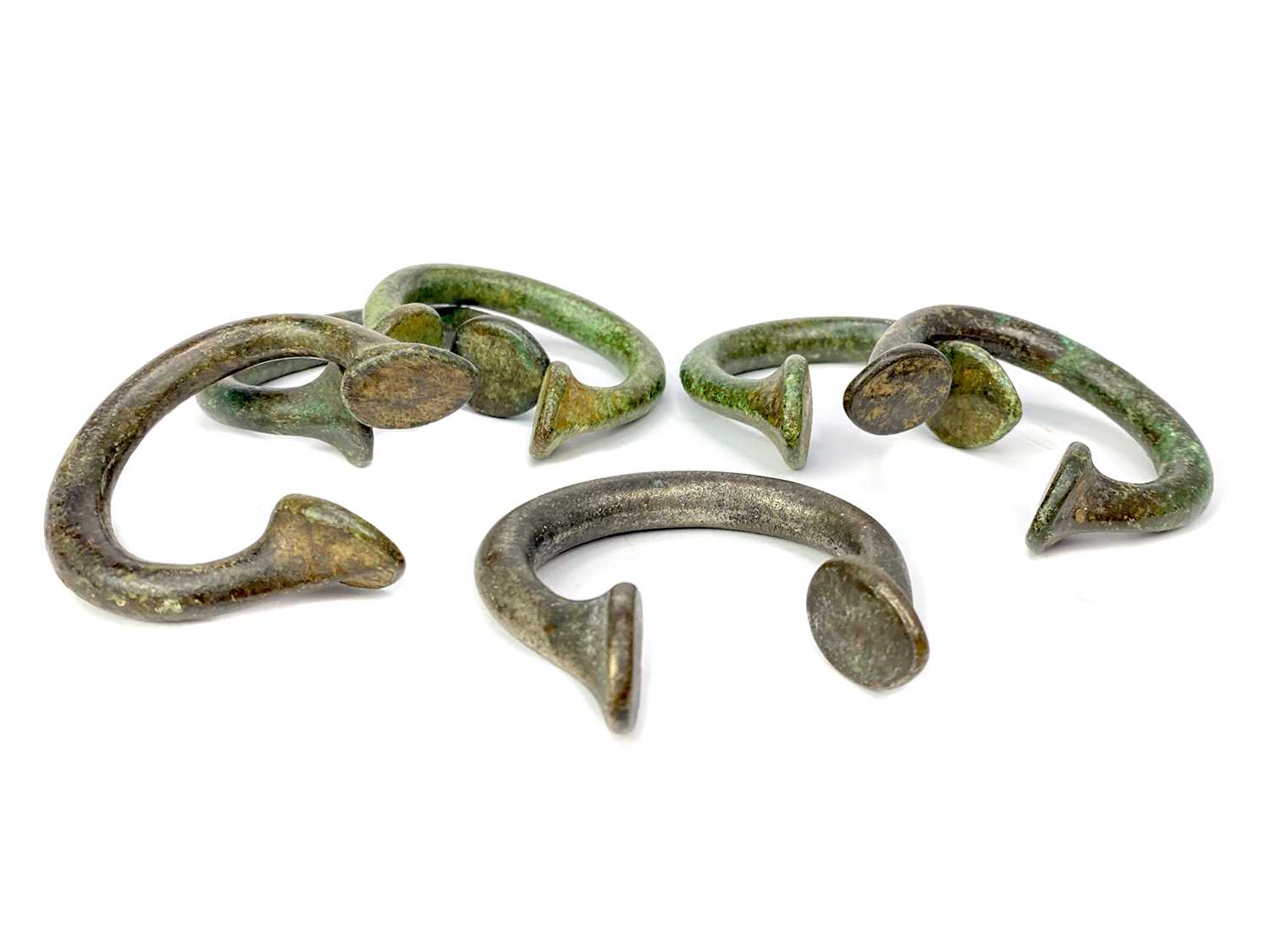 Lot 790 - A LOT OF SIX AFRICAN BRONZE MANILLAS