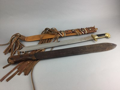 Lot 79 - AN EARLY 20TH CENTURY MACHETE, ALONG WITH OTHER AFRICAN WEAPONRY