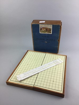 Lot 228 - A GWR JIGSAW PUZZLE, A GAME AND SLIDE RULE