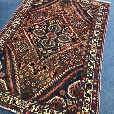 Lot 379 - A 20TH CENTURY PERSIAN RUG