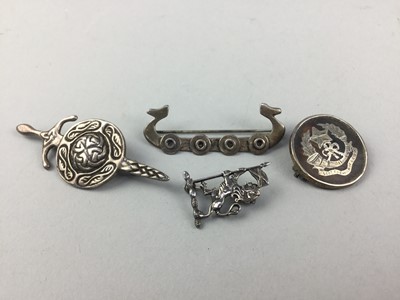 Lot 175 - AN IONA SILVER LION RAMPANT BROOCH AND OTHERS